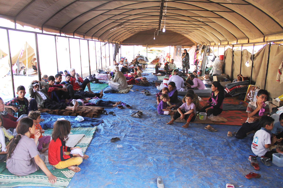 Flüchtlinge aus dem Irak warten darauf, dass sie in ihr Heimatland zurückkehren können. (Foto: DFID – Rachel Unkovic (CC BY 2.0) / Wikimedia Commons)